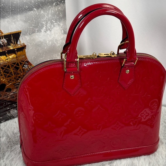 Louis Vuitton Handbags - Louis Vuitton Alma Patent Leather  Vernis PM Wine Red. Code FL3103